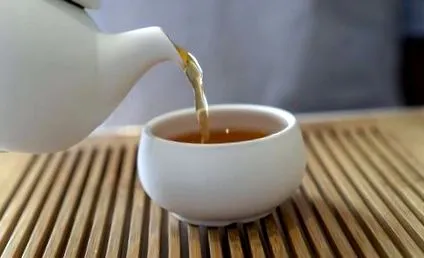 який