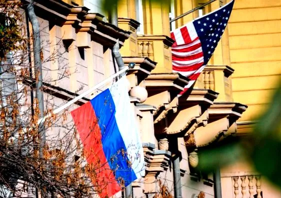 американського