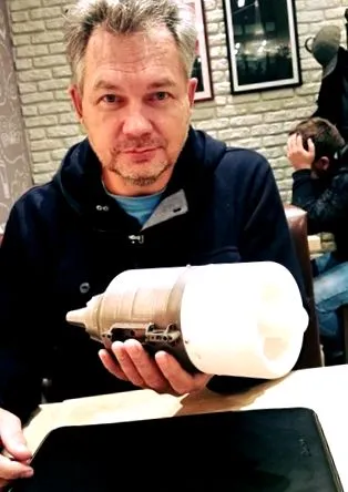 який