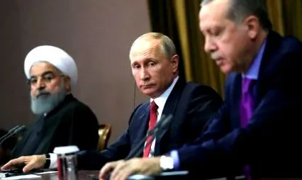 путін