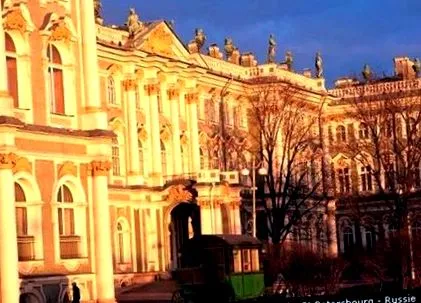 російська
