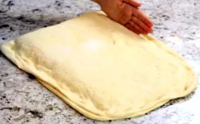 како