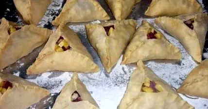 како