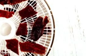 како