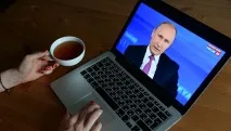 український