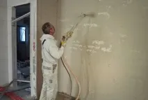 Машинна штукатурка стін способом