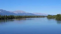 річці