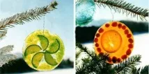 Наряджаємо іграшками з льоду ялинку на вулиці льоду