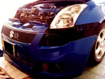 Знімаємо передній бампер із Suzuki Swift swift