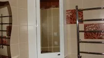 Навісна шафа у ванній кімнаті навісна