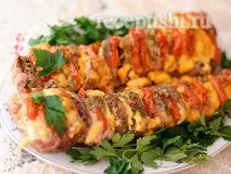 Свинина - гармошка, запечена з сиром та помідорами, Кулінарні рецепти з фото сиром