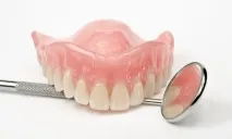 протез