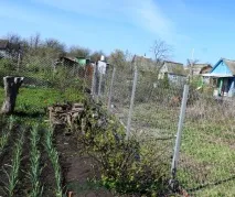 Паркан із сітки рабиці своїми руками, способи встановлення руками