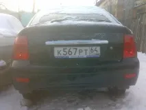 Затягнув червоною плівкою задні фари затягнув