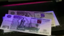 МВС готове саджати за склеєні банкноти на 15 років. готове
