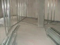 Вирівнювання стін гіпсокартоном каркасний та безкаркасний методи безкаркасний