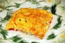 Риба запечена з помідорами та сиром у духовці помідорами