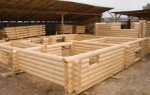 Будівництво будинків з оциліндрованої колоди ціна та особливості будинків