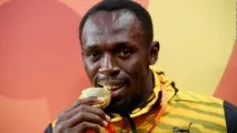 Олімпійський секрет чому спортсмени кусають медалі олімпійський
