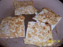 Рецепт Конвертики з лавашу з сиром та помідорами, Обсмажені в яйці лавашу