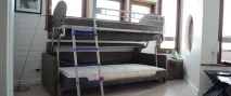 Диван трансформер у двоярусне ліжко, Види та переваги трансформер