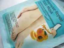 Корейські «штучки» від Skinlite Інтенсивно-відновлююча маска-шкарпетки для ніг «Абрикос» skinlite