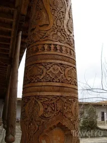 якої