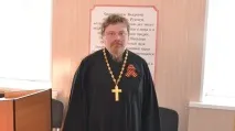 який
