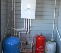 Газова колонка на зрідженому газі витрата, проточна колонка для дачі без димоходу газі