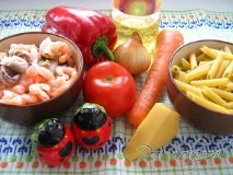 Паста з морепродуктами у вершковому соусі з травами морепродуктами