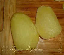 Баклажани з помідорами, картоплею та сиром. сиром