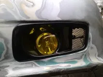 передній