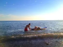 серфер