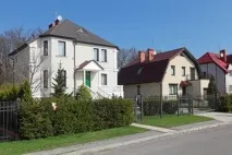 Оздоблення фасаду будинку штукатуркою фасаду
