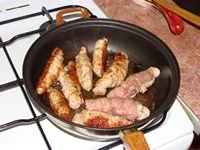 Пальчики зі свинини із салом салом