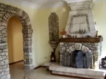 Варіанти обробки печей та камінів у будинку плитка, камінь чи цегла печей