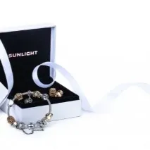 Браслети Sunlight (98 фото) жіночі моделі з шармами текстильні, з перлів та діамантами, фото