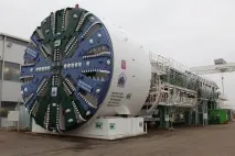 який