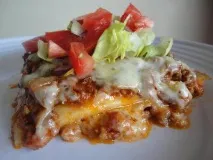 Лазання з грибами та шинкою, фаршем, куркою, сиром, м’ясом. сиром