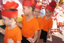 український