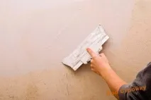 Штукатурка стін допомогою