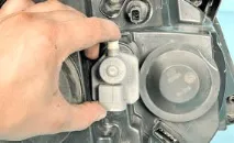 Заміна електрокоректора світла блок-фари Nissan Qashqai 2007 заміна
