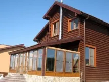Як виконується скління ганку можна