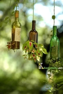 Перегорнутий горщик із скляної пляшки скляної