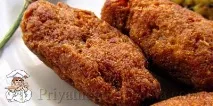 Свинячі рулетики з чорносливом та сиром чорносливом