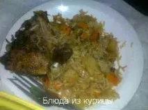 Тушкована качка з рисом качка