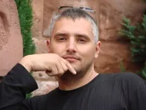 мене