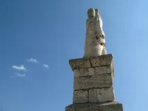 водій