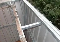 Зовнішнє оздоблення балконів та лоджій сайдингом оздоблення