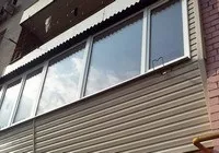 Зовнішнє оздоблення балконів та лоджій сайдингом балконів